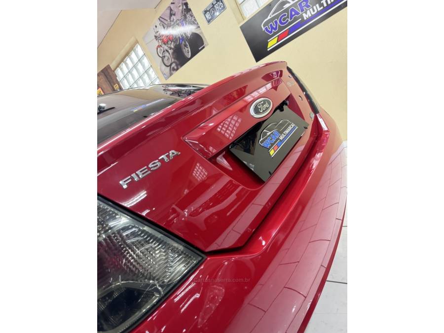 FORD - FIESTA - 2012/2013 - Vermelha - R$ 34.900,00
