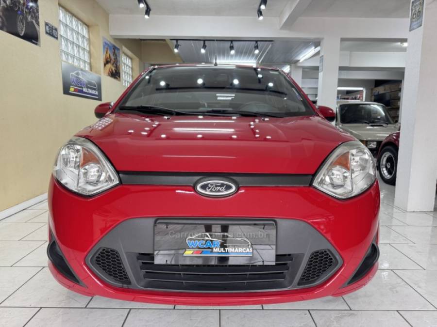 FORD - FIESTA - 2012/2013 - Vermelha - R$ 34.900,00